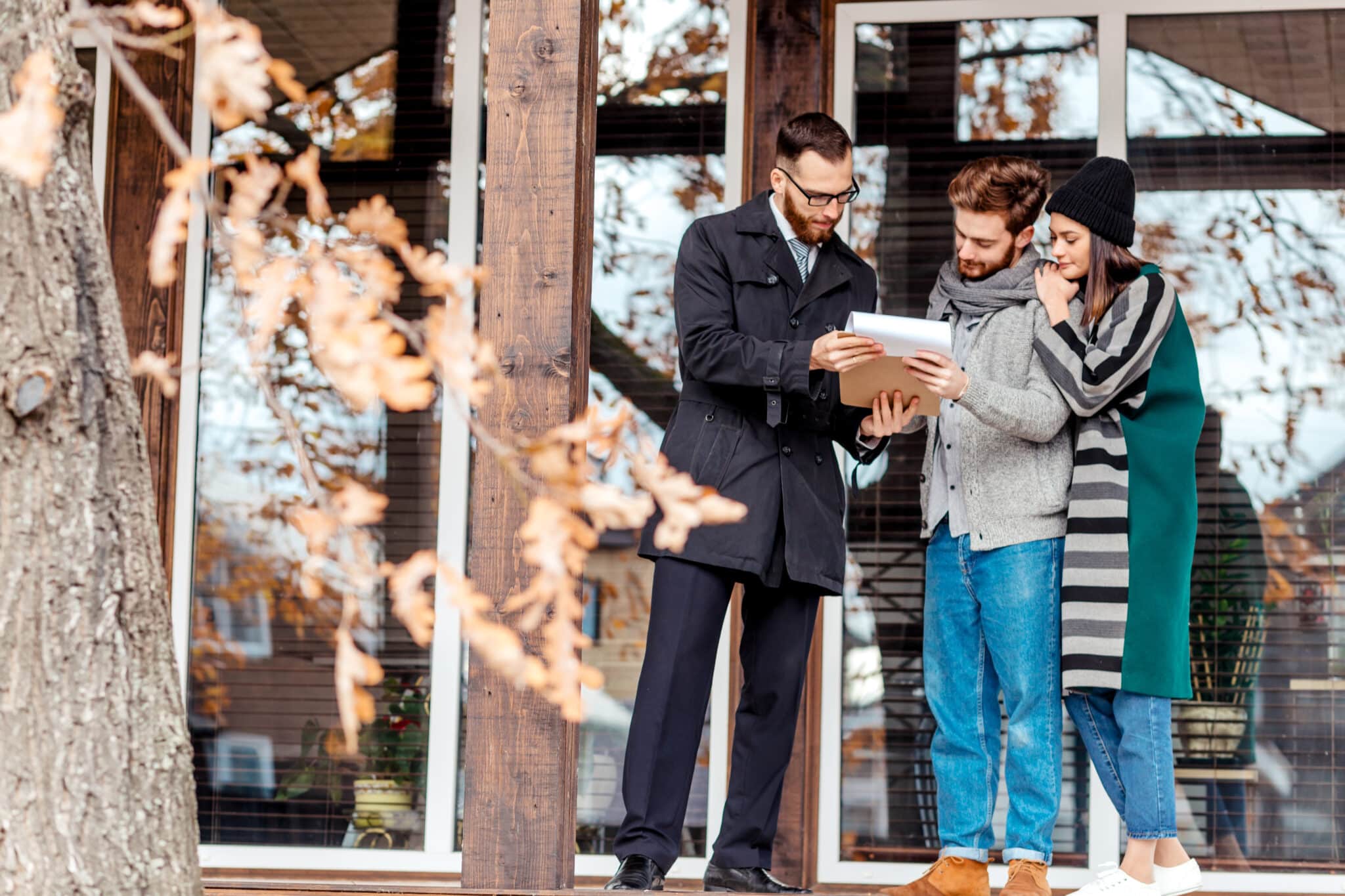 Property Viewings in Burwell: A Buyer's Full Checklist 1 young couple with real estate agent near house 2026 03 24 10 14 03 utc scaled